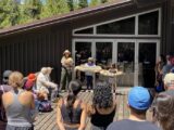 people watching a ranger program