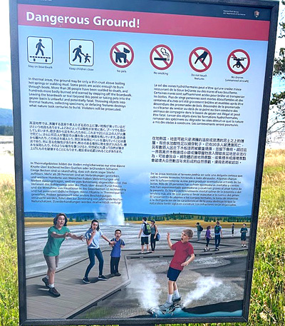 sign about dangerous ground in Yellowstone park